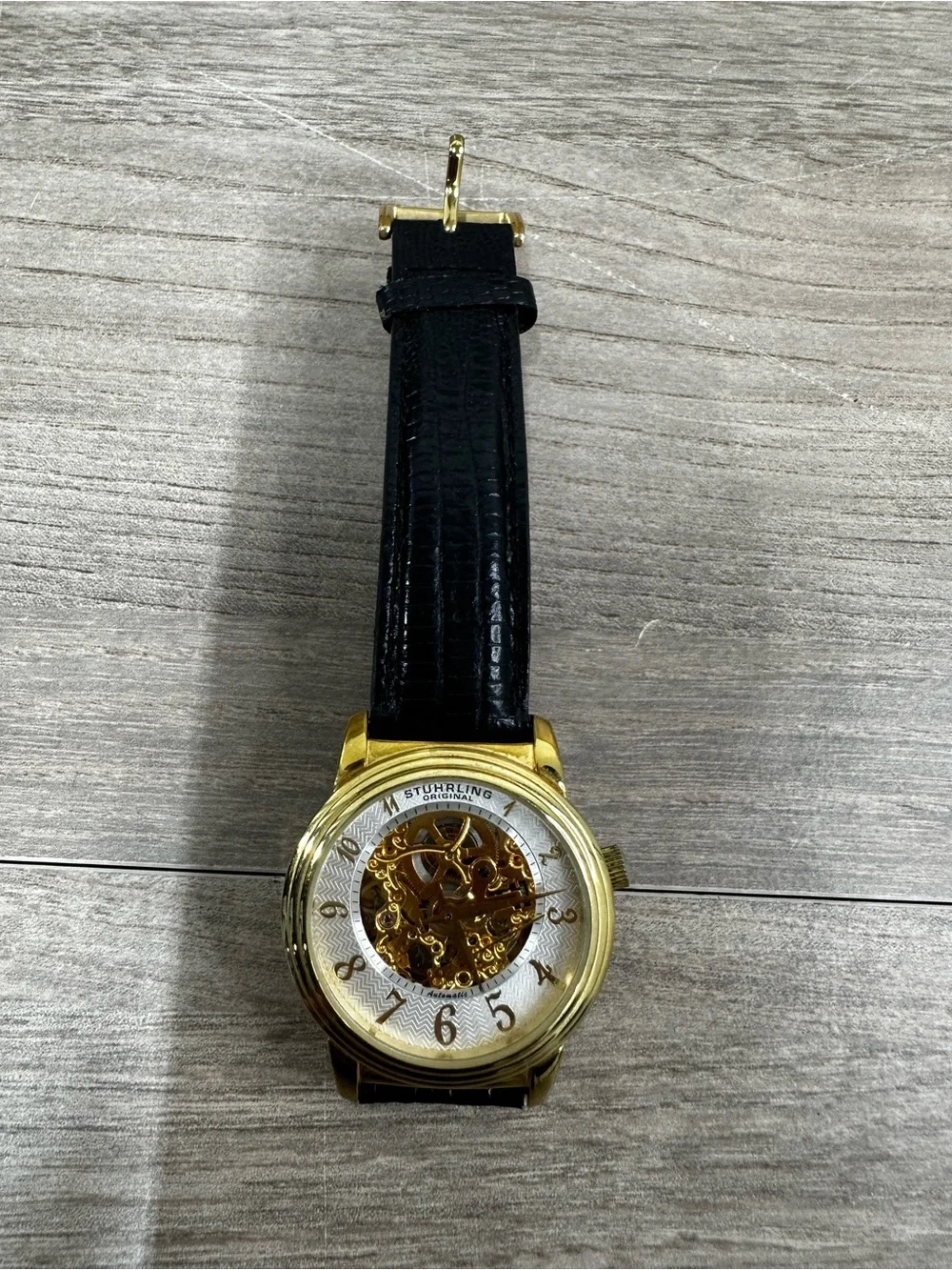 Stührling Automatic Men's Dress Watch Gold Skeleton Dial Black Band